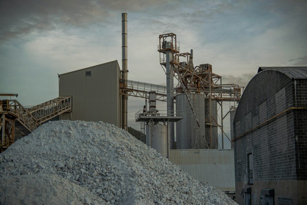 Cement workers face global health risks from dust, toxins, and burns. Top producers like China, India, US, and Vietnam show gaps in safety and regulation